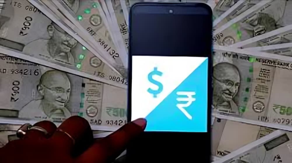 Rupee Slips to 90.16 Against Dollar Amid Offshore Dollar Demand and Market Pressure