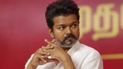 DMK and VCK Exchange Political Criticism Over Participation in Vijay Led Tamilaga Vettri Kazhagam Go